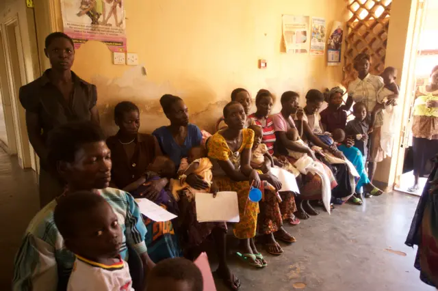 Queue of parents with children at Kitgum Hospital in northern Uganda
