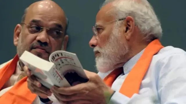 மோதி, ஷா