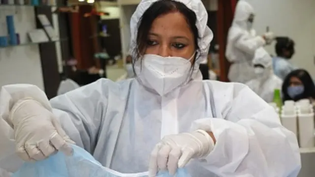 Women hairdressers working in a ladies beauty parlour