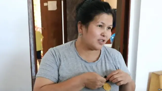 मां को मेडल