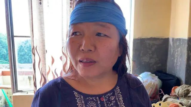 52 वर्षांच्या नेंगनेई मणिपूर ओलांडून शेजारच्या मिझोराममध्ये पोहोचल्या.