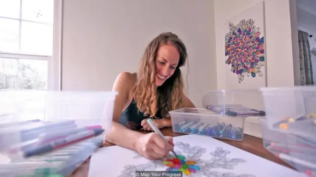 Amy Jones started selling goal-tracking art after a visual aid helped her pay off $26,000 in debt. Each swirl on her canvas represented $100 paid off