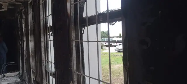 Foto of di Kogi State House of Assembly wey fire burn