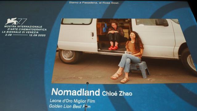 Director Chloe Zhao and actor Frances McDormand accept the Golden Lion - via Zoom - for Nomadland