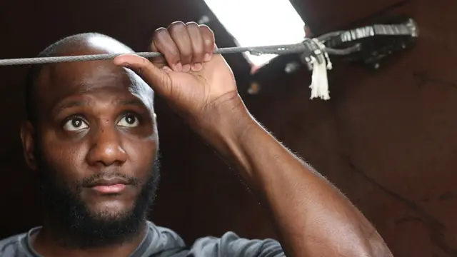 Man looking out in sadness