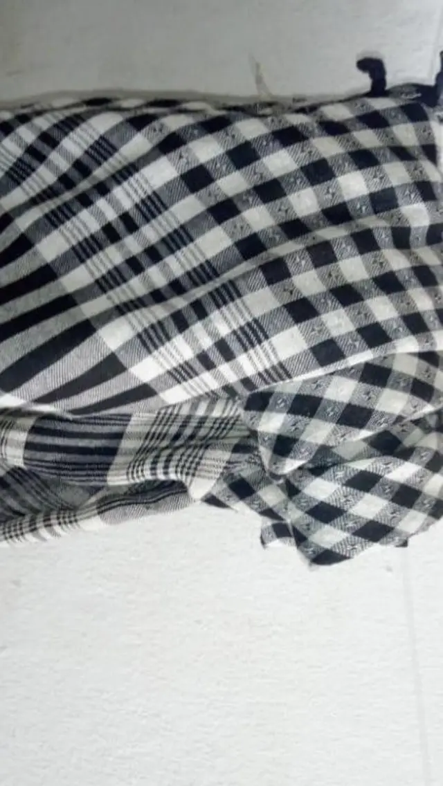 Material Sani dey use cover im chest if e wan go outside