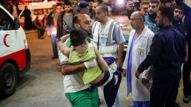 Palestinians injured in Israeli raids arrive on October 17, 2023 in Khan Yunis, in the southern Gaza Strip, Gaza. Gazans are evacuating to the south as advised by the Israeli government, ahead of an expected Israeli ground offensive.