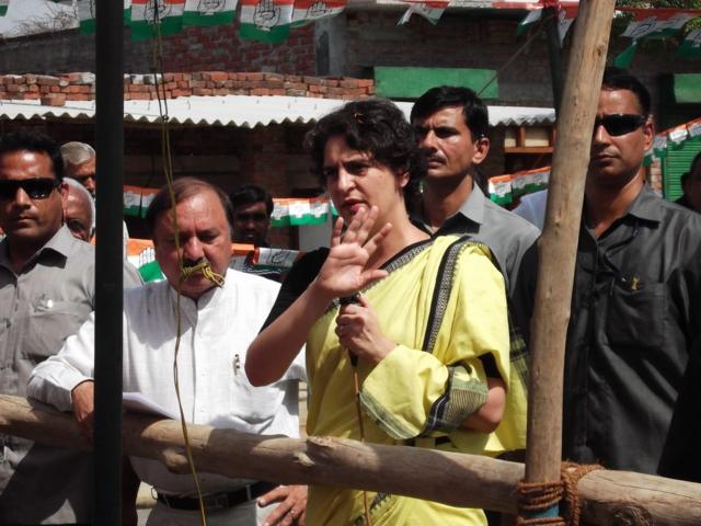 Priyanka is talking to BBC Bengal during the 2014 election campaign, with KL Sharma by her side