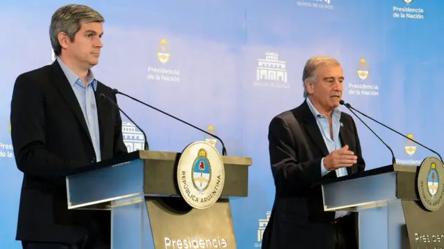 Marcos Peña y Oscar Aguad