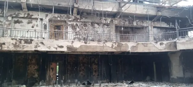 Foto of di Kogi State House of Assembly wey fire burn