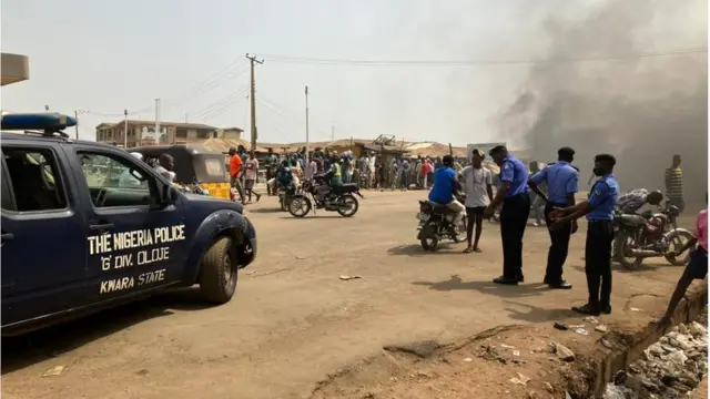 Pipo stand as police dey maintain order afta protest