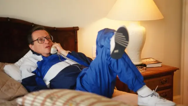 Ларри Кинг в спортивном костюме. 1990 год