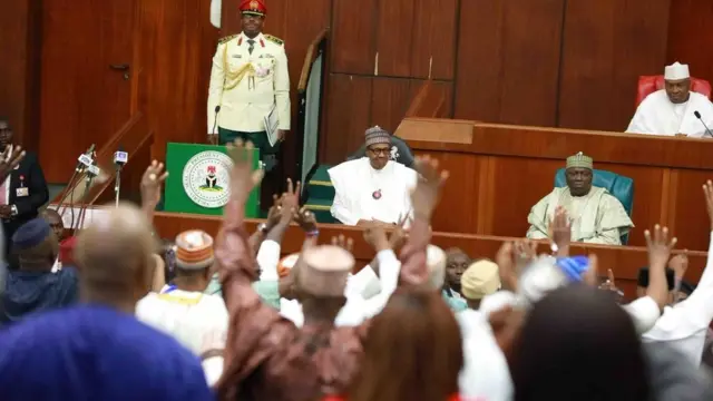 Buhari presnt 8.83 trillion naira 2019 budget wey big pass 8.26 trillion wey im present for 2018 but small pas di 9.12 im finally approve for June 2018