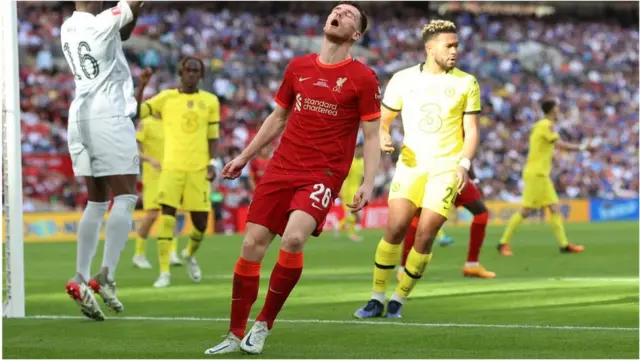 Andrew Robertson (centre)