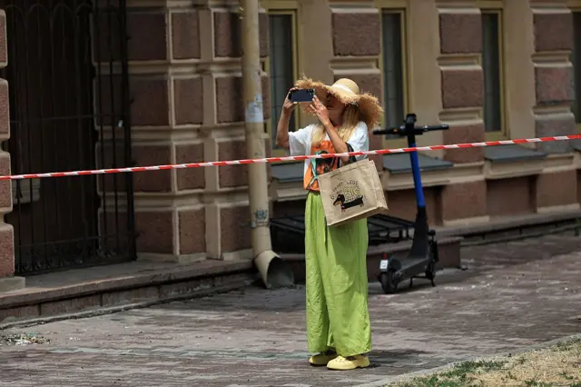 Turista toma fotos