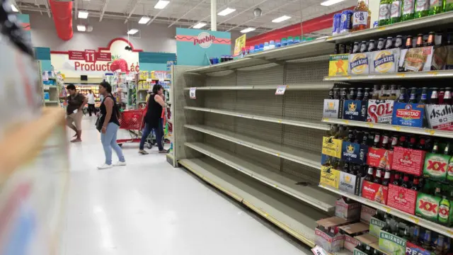 Empty shelves in a supermarket in San Juan, in Puerto Rico