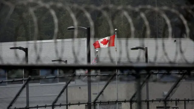 A Canadian flag flies outside of the Alouette Correctional Centre for Women, where Huawei CFO Meng Wanzhou is being held on an extradition warrant, in Maple Ridge, British Columbia, Canada December 8, 2018.