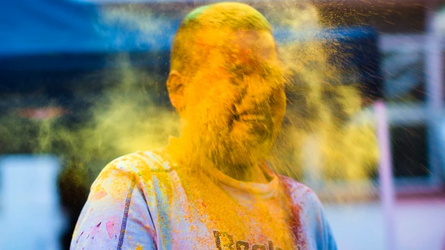 A person with yellow powder on their face in Durban, South Africa - Monday 9 March 2020