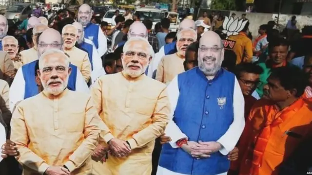 મોદી અને અમિત શાહના મુખોટા