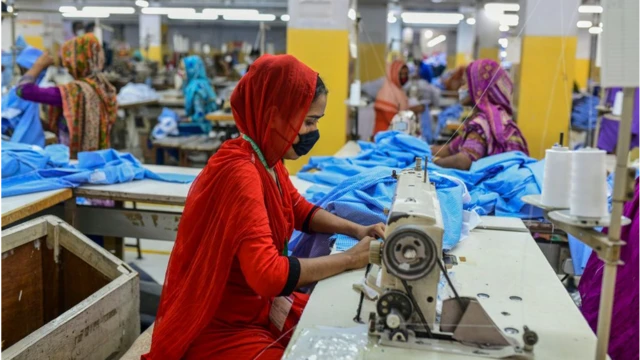 Woman working at a Bangladesh clothing factory
