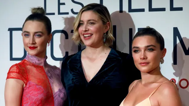Greta Gerwig (centre) with Little Women stars Saoirse Ronan (left) and Florence Pugh