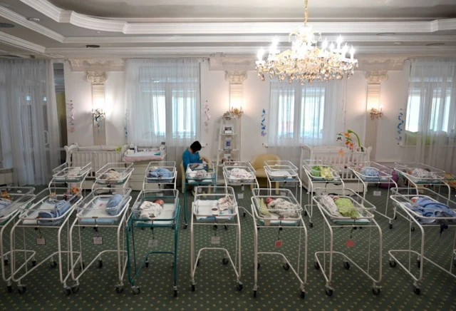 Rows of cots in the Venice hotel, owned by Biotexcom
