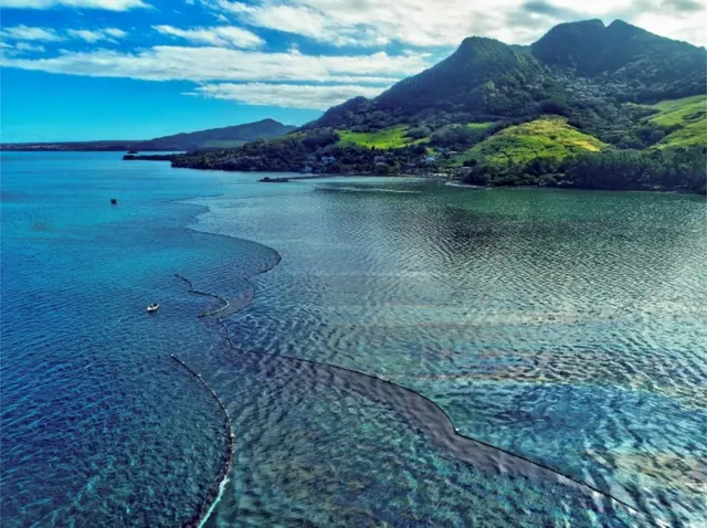 A drone image shows the oil spillage near the area where the bulk carrier ship MV Wakashio, belonging to a Japanese company but Panamanian-flagged, ran aground on a reef, at Riviere des Creoles, Mauritius.