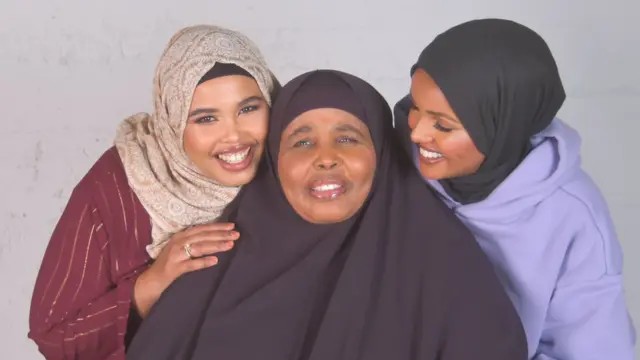 Halima Aden with her mum and sister Fadumo Aden