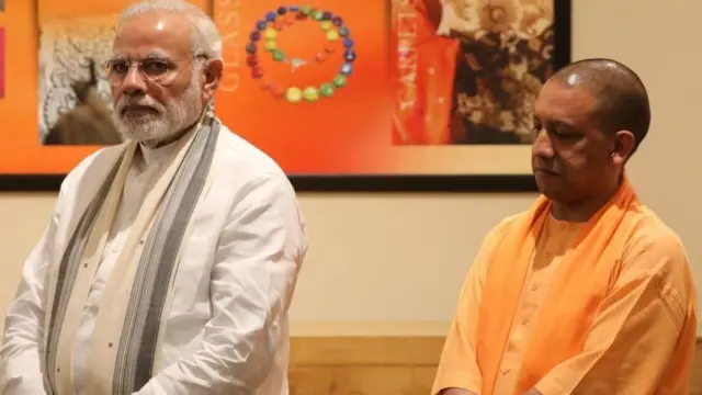 નરેન્દ્ર મોદી અને ઉત્તર પ્રદેશના મુખ્ય પ્રધાન યોગી આદિત્યનાથ