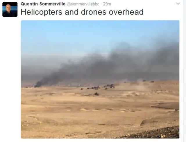 Quentin Sommerville tweet that reads: "Helicopters and drones overhead."