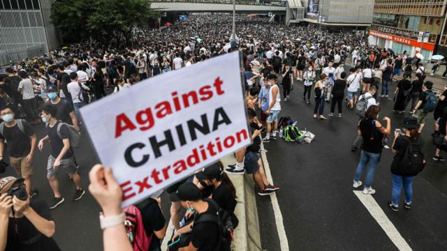 Sign in Hong Kong protest saying "against China extradition"