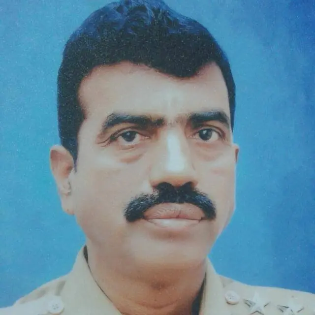 முன்னாள் உதவி ஆணையர் கணேசன்