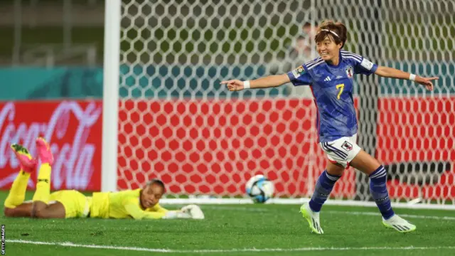 Japan's Hinata Miyazawa of Japan celebrates after scoring against Zambia
