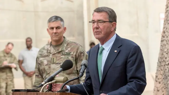 Office of the Secretary of Defense handout shows US Secretary of Defense Ash Carter (R) and US Army Lt. Gen. Stephen Townsend, commander of Combined Joint Task Force-Operation Inherent Resolve, host a press conference at the task force's headquarters in Baghdad, Iraq, 22 October 2016.