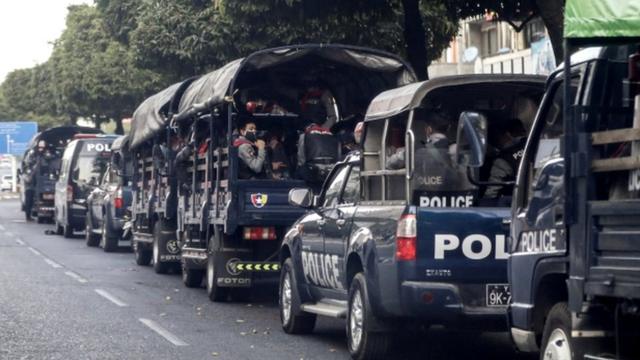 Police vehicles line up in Sule Pagoda Road, Yangon.