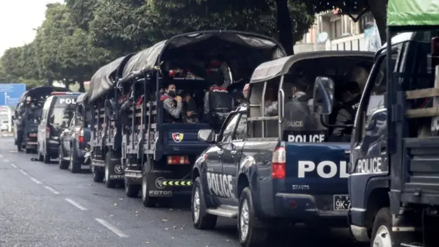 Police vehicles line up in Sule Pagoda Road, Yangon.
