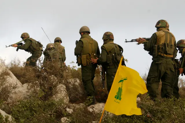 A group of Hezbollah fighters is stationed in the village of Sujoud in southern Lebanon