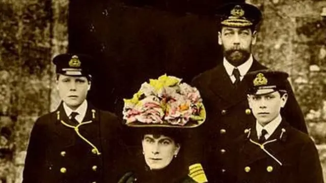 Edward with his father, King George V, his mother, Queen Mary, and his brother, Albert