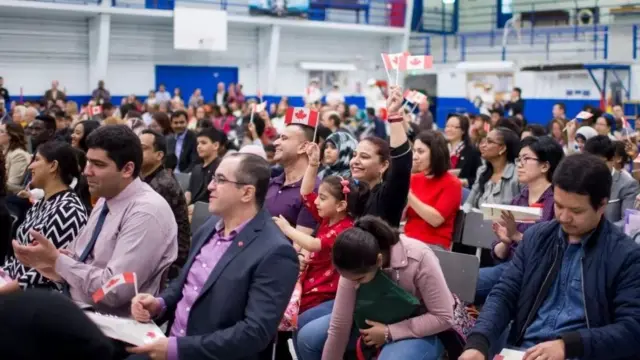 Hafi umwe ku banyacanada bane yaje muri icyo gihugu nk'umwimukira