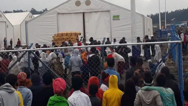 ስደተኞች በመጠለያ ጣቢያ