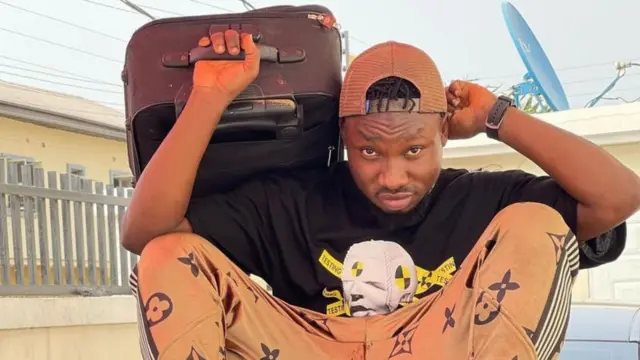 One man carry bag for back