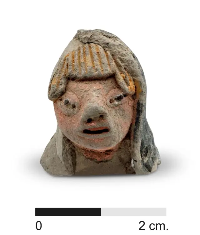 Голова статуетки