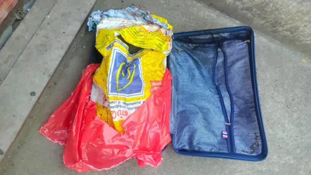 அமீர் அலியின் உடல் வைக்க பயன்படுத்தப்பட்ட சூட்கேஸ்