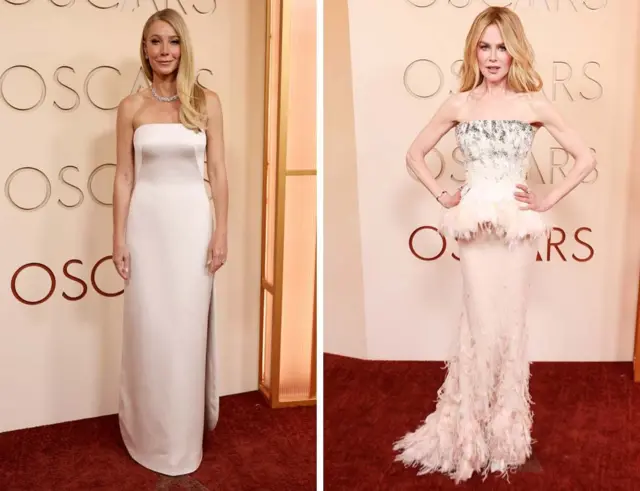 Гвінет Пелтроу та Ніколь Кідман у своїх оскарівських сукнях. Обидві вони одягнені в довгі сукні дуже ніжно-рожевого кольору