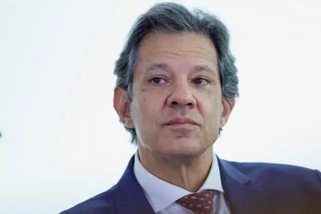 Fernando Haddad, um homem brancojogos mobile para jogar com amigosmeia idade e cabelo grisalho