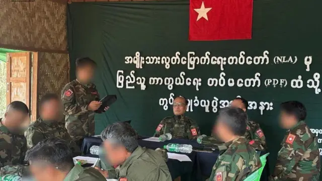 မတ်လမှာ NLA အဖွဲ့က NUG ရဲ့ ကွပ်ကဲမှုအောက်ရောက်ကြောင်း ပွဲအခမ်းအနားပြုလုပ်ပြီး ပြည်ထောင်စုဝန်ကြီး ဒေါက်တာဇော်ဝေစိုးတက်ရောက်