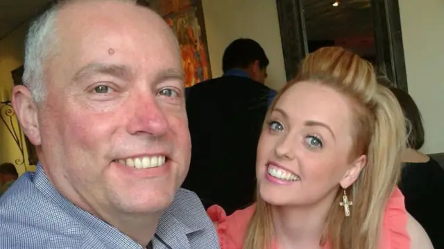 A smiling Nick Gazzard and daughter Hollie pictured during a meal at a restaurant