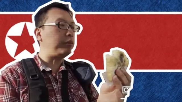 Aram Pan y bandera norcoreana