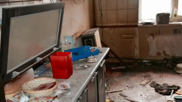 Дом, подвергшийся обстрелу