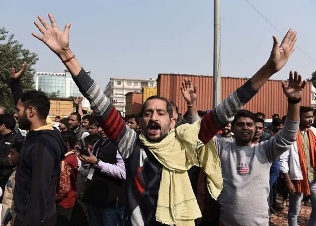 Right Wing members shout slogans to disrupt Namaz in open by Muslim community at Sector 37, on December 10, 2021 in Gurugram, India
